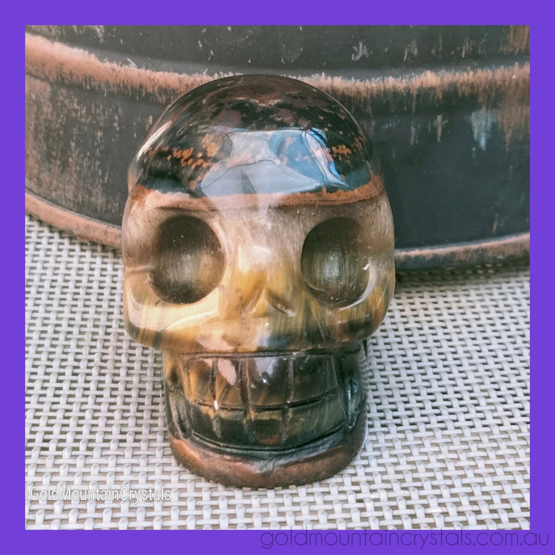 tigers eye skull carving