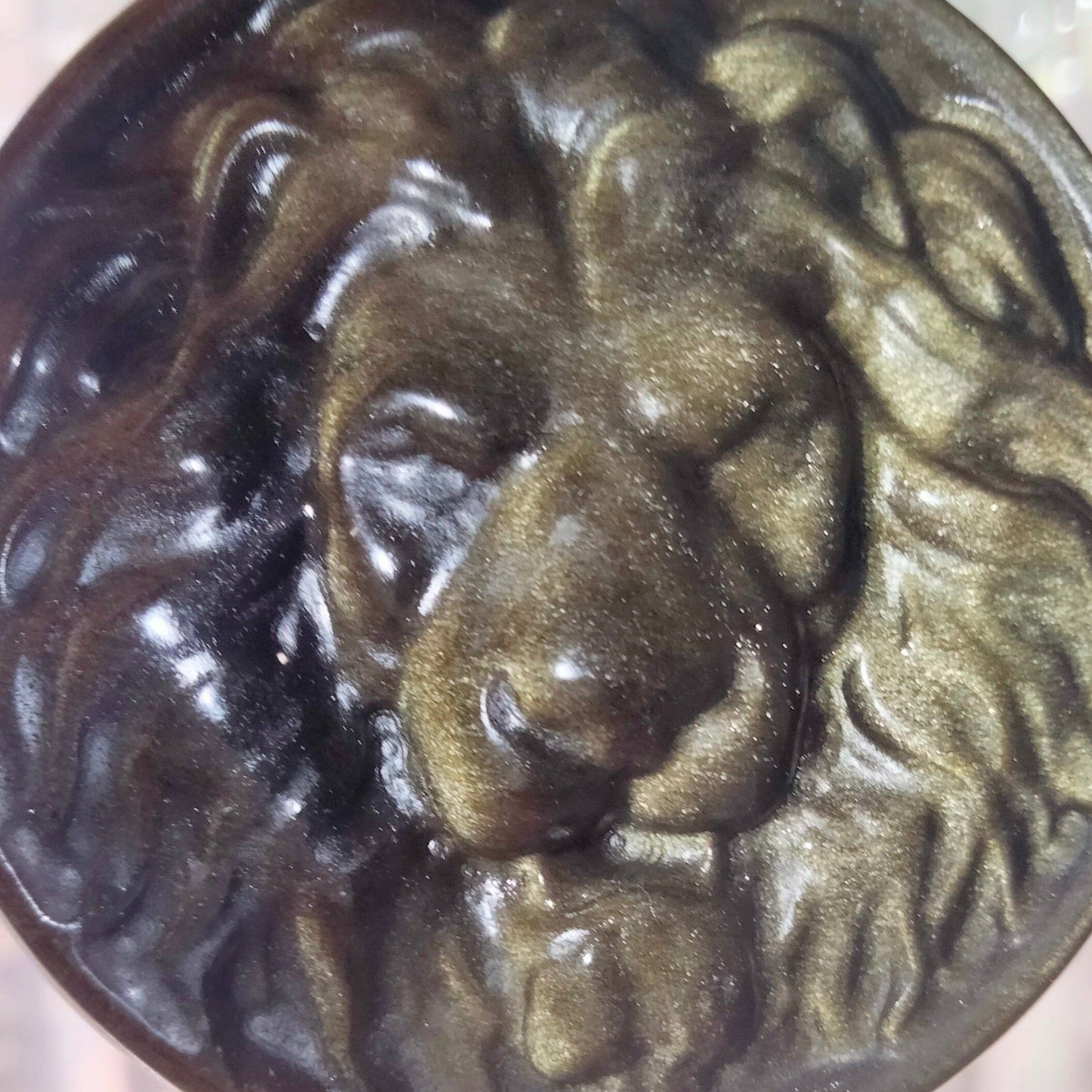 gold sheen obsidian lion carving and display frame