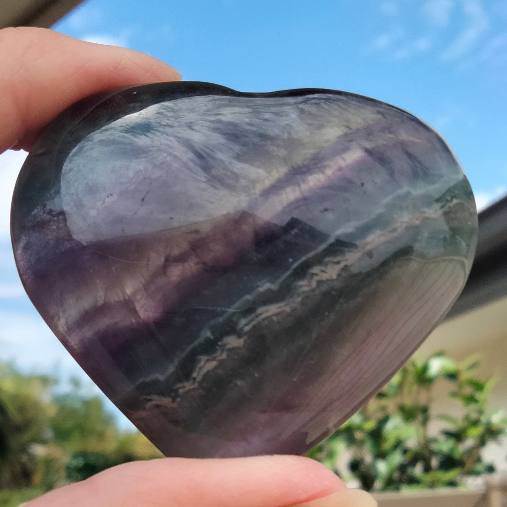 Rainbow fluorite heart with rare blue