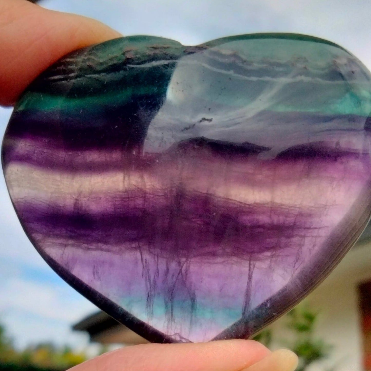 Rainbow fluorite heart with rare blue