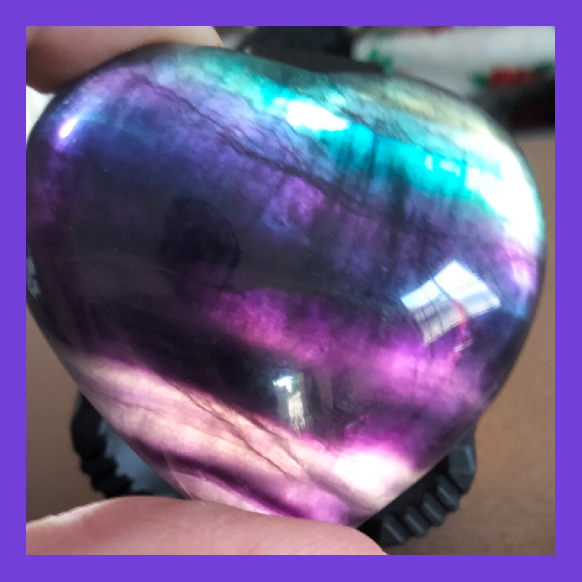 Rainbow fluorite heart with rare blue.