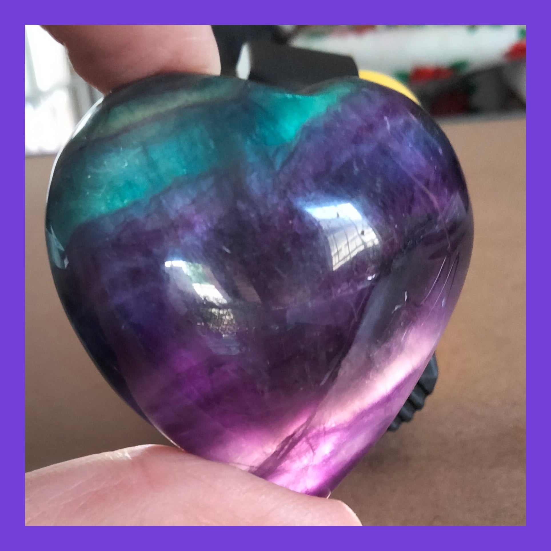 Rainbow fluorite heart with rare blue.